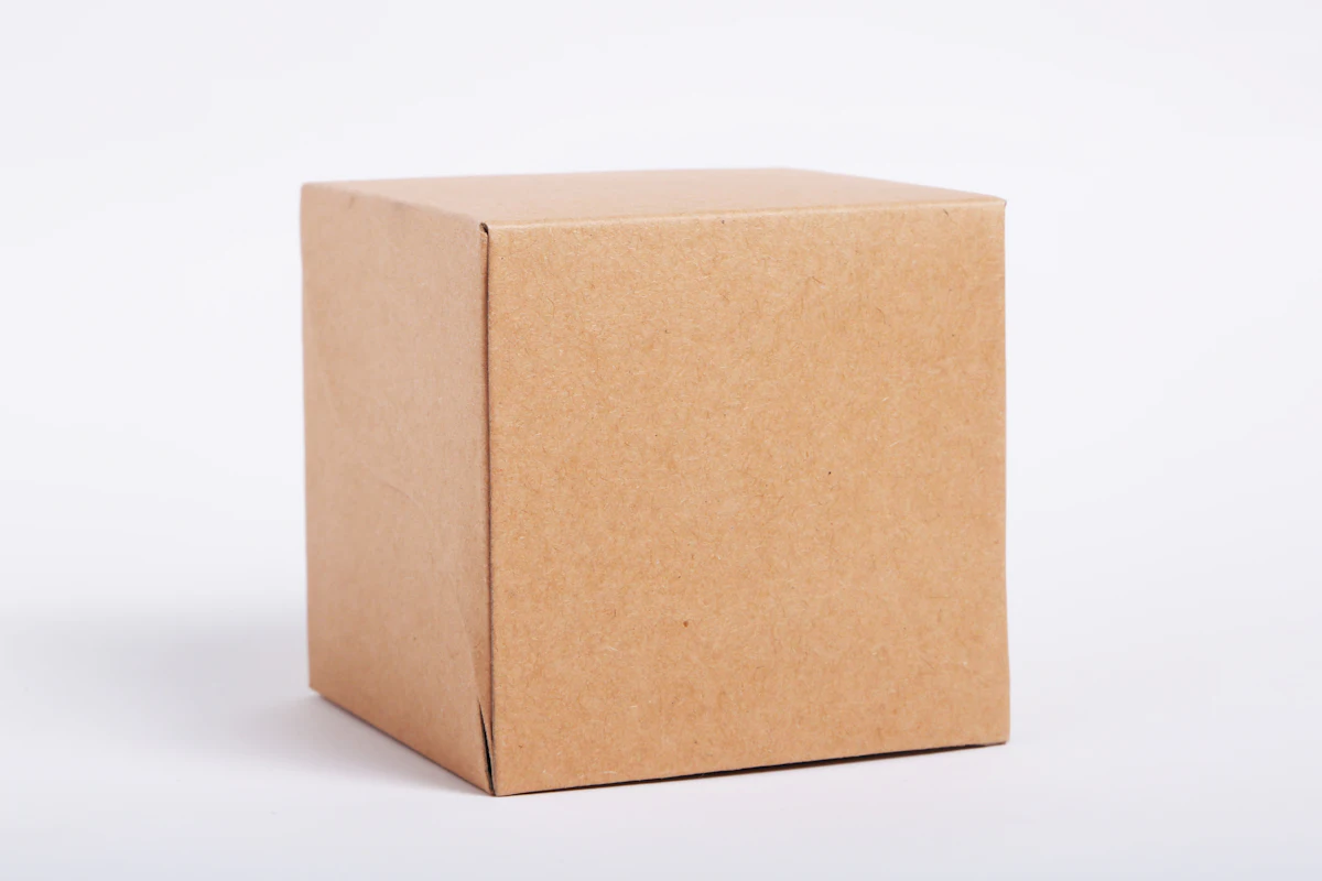 A plain cardboard box on a white background